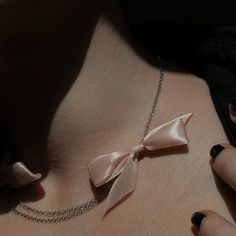 -Stainless Steel, Black Ribbon -Adjustable - Fits Circumference from 16″ - 20″ (40.6cm - 50.8cm) ▶ Ready to Ship on MAY 6TH ---- Dusty Pink Bow Choker Necklace ---- The Pink Bow Choker Necklace is a delicate choker necklace featuring two dusty pink ribbon bows and double stainless steel chain design. Great for a special occasion and your everyday look. Made from lightweight stainless steel, it offers durability without compromising on comfort. The adjustable chain at the back ensures a perfect fit for every wearer. - 2404 Collection ★ SEE BLACK BOW NECKLACE --> https://www.etsy.com/listing/1702806844/necklace-black-bow-choker-stainless?click_key=d18c3e31134daaf13461e7180d266038cf5b143e%3A1702806844&click_sum=4a14465c&ref=shop_home_active_1&frs=1&sts=1  MATERIAL Stainless Steel, Ribbon  SIZ Feminine Bow Necklace For Party, Pink Necklaces For Birthday Gift, Delicate Bow Necklace For Party, Cute Necklaces For Mother's Day Party, Pink Ribbon Jewelry As Gift, Dainty Ribbon Jewelry For Gifts, Pink Ribbon Jewelry Gift, Pink Ribbon Jewelry For Gifts, Pink Bow Necklace For Party