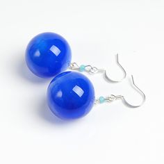 "These Blue ball dangle earrings are good for everyday outfits and for special occasions. They can be a great gift for her! Dimensions: total length is 2\" inch (5cm), ball diameter 0.9\" inch (2.2cm). Materials: artist lampwork glass beads, silver plated hooks. Colors used: blue. For your information: ✦ Get free shipping when you buy any two or more items! ✦ All jewelry is shipped with some kind of gift wrapping, box or bag depending on size. ✦ Your order will be packed very carefully and will Orb Earrings, Sphere Earrings, Hollow Earrings, Bubble Earrings, Blue Drop Earrings, Cobalt Blue Earrings, Glass Bubble, Earrings Big, Blue Ball