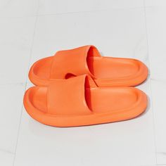 From The Pool To The Supermarket, These Rubber Slides Are All Comfort And All Style. Their Slide-On Design Makes Them Ideal For When You're Running Late, And Their Rubber Composition Makes Them The Perfect Pool Companion. Slide These On With A Matching Lounge Set, Cutoffs And A Tee, Or Biker Shorts And A Crop Cami. - Size: Multiple Available - 6 / 7 / 8 / 9 / 10 - Color: Orange - Width: Standard - Style: Slide Sandal - Open Toe - Rounded Shape - Flat Heel - Slip On - Material: Rubber - Waterproo Comfortable Orange Slides With Round Toe, Orange Slip-on Slippers For Summer, Orange Slip-on Summer Slippers, Comfortable Orange Round Toe Slides, Orange Flat Slippers For Summer, Comfortable Orange Summer Slippers, Orange Flat Synthetic Slippers, Summer Flat Orange Slippers, Comfortable Orange Slide Sandals