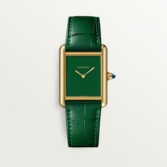 Cartier - Tank Louis Cartier watch - Watch Gold/Gold/Leather - Tank Louis Cartier watch, large model, Manufacture mechanical movement with manual winding. 18K yellow gold (750/1000) case, beaded crown set with a sapphire cabochon. Green lacquer-effect dial, gold-finish steel sword-shaped hands, mineral crystal. Semi-matte green alligator-skin strap, 18K yellow gold (750/1000) ardillon buckle. Case dimensions: 33.7 mm x 25.5 mm. Thickness: 6.6 mm. Water-resistant up to 3 bar (approx. 30 meters/100 feet). Cartier Green Watch, Cartier Watches Women Tank Cartier, Cartier Tank Francaise Small Gold, Vintage Yellow Gold Cartier Watch, Vintage Cartier Yellow Gold Watch, Beaded Crown, Green Watch, Alligator Skin, Cartier Tank