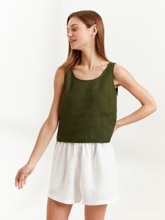 "CALI is a sleeveless tank top with scoop neckline and relaxed fit. DETAILS - Scoop neck - Sleeveless design - Straight cut - Oeko-Tex certified 100% local washed midweight linen - Cut and sewn to order just for you in our studio SIZING & FIT - Fits true to size - Length 18.5\" - Model is 5'8.9\" / 175cm and wearing a size S CARE FOR LINEN - Machine wash up to 30ºC/86ºF gentle cycle - Lay flat to dry or tumble dry low - Warm iron if needed - Do not bleach SIZE GUIDE Size conversion guide Size XS Linen Crop Top, Linen Tank Top, Linen Crops, Linen Tank, Summer Blouses, Top Sleeveless, Linen Top, Linen Women, Long Blouse