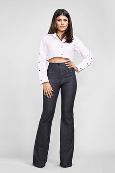 A cropped hem is super flattering and shows off just the right amount of skin when you rock this classy button-up shirt that features a slightly oversized fit that keeps it feeling relaxed and comfortable. This top-meets-jacket is the best of both worlds! It's updated with a cropped silhouette, so you can keep it cozy while still looking stylish. Go ahead and rock a cropped hem shirt with confidence! How To Style And Wear Your Crop Top You`ll pull off a perfectly chic look with minimum effort se Cropped Shirt Pattern, Chic Fitted Cropped Shirt With Button Closure, Chic Fitted Cropped Shirt With Button Cuffs, Button Up Crop Top Sewing Pattern, Luxury Fitted Button-up Cropped Shirt, Shirt Patterns For Women, Crop Top Sewing Pattern, Shirt Sewing Pattern, Crop Top Shirts