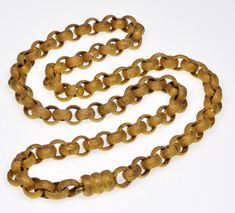 Rare Georgian well crafted textured gilded brass chain necklace C.1790. It is 18 1/2 inches long 7.5 mm thick. The necklace is authentic with original push-in clasp. Excellent antique condition commensurate with age. Antique Formal Chain Necklaces, Antique Style Oval Link Chain Necklace, Antique Oval Link Engraved Necklace, Victorian Hallmarked Link Necklace, Antique Link Necklace For Formal Occasions, Victorian Link Necklace Hallmarked, Antique Link Necklaces For Formal Occasions, Antique Style Formal Chain Necklace, Antique Necklaces For Formal Occasions