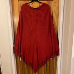 Red Poncho Red One-size Poncho Cape, Red Long Sleeve Poncho, One Size, Red One-size Cape Poncho, Red One Size Cape Poncho, Red Winter Cape One Size, Casual Red Long Sleeve Poncho, Red Oversized Poncho For Winter, Oversized Red Poncho For Winter, Oversized Red Poncho Cape