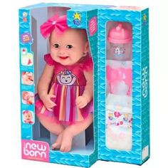 a baby doll in a box with its packaging