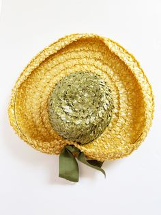 Lovely midcentury summer hat - Wide, upturned yellow straw brim - Tall green straw crown wrapped with matching green grosgrain ribbon - Bow at back - Grosgrain ribbon band inside - Label: Reproduction of Paulette Green Fedora Straw Hat For Kentucky Derby, Green Straw Hat With Curved Brim For Garden Party, Green Short Brim Straw Hat For Kentucky Derby, Green Brimmed Straw Hat For Garden Party, Green Curved Brim Straw Hat For Garden Party, Green Wide Brim Straw Hat For Garden Party, Green Wide Brim Sun Hat For Garden Party, Green Straw Sun Hat With Curved Brim, Green Straw Sun Hat With Short Brim