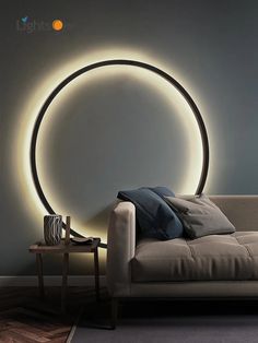 a living room with a couch and a round light