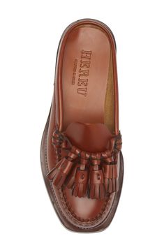 A dramatic cluster of tassels charms the vamp of this playful loafer slashed and reissued as a street-chic mule. Leather upper, lining and sole Made in Spain Shoe Game Women, Hereu Sandals, Hereu Shoes, Loafer Mules Outfit, Mule Outfits, Cowhide Shoes, Leather Charms, Chic Street Wear, Western Mules