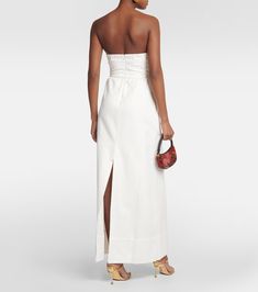 Matelassé cutout strapless maxi dress in white - Adriana Degreas | Mytheresa Strapless Fitted Maxi Dress For Daywear, Cotton Bandeau Strapless Dress, Summer Cotton Strapless Maxi Dress, Elegant Cotton Dresses With Side Slits, Chic Bandeau Maxi Dress, Chic Bandeau Maxi Dress For Day Out, Elegant Strapless Maxi Dress For Day Out, Elegant Cotton Maxi Dress With Straight Neckline, Strapless Cotton Maxi Dress For Spring