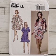 a woman's dress and top sewing pattern on a wooden background with the words butterick written below it