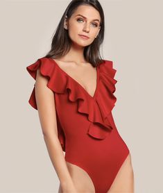 This sexy but sweet bodysuit is perfection. Featuring a a ruffled trim collar with a plunging v-neckline, an open back and a sleeveless fitted form. This bodysuit pairs perfectly with pants, jeans, skirts, shorts or leggings. Made with a nylon and spandex blend for comfort and style while hugging your every curve. Comes in two fabulous collars from which to choose. Silk Bodysuit, Basic Bodysuit, Backless Bodysuit, Red Bodysuit, Bodysuit Blouse, Ruffle Bodysuit, Women's Button Down Shirt, Leotards Ballet, Classic Style Women