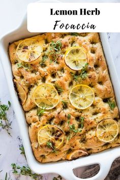 lemon herb focaccia in a white casserole dish