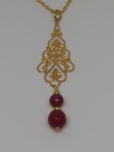 This beautiful Ruby Chalcedony necklace will be an elegant addition to any outfit for that special occasion. The gold plated findings and chain make the vibrant red really stand out. Chalcedony Necklace, Tourmaline Pendant, Wood Necklace, Jasper Pendant, Vibrant Red, Pendant Necklaces, Jewelry Art, Jewelry Necklace Pendant, Special Occasion