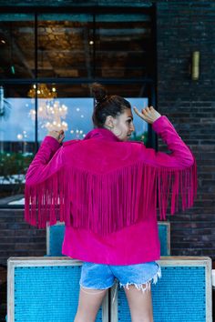 Fuchsia-coloured boho fringe jacket made of natural suede Chic Fringe Outerwear For Festivals, Chic Festival Outerwear With Fringe, Winter Leather Jacket With Tassels, Winter Leather Jacket With Tassels Long Sleeve, Spring Suede Fringe Outerwear, Spring Suede Outerwear With Fringe, Bohemian Winter Leather Jacket With Fringe, Fall Festival Leather Jacket With Fringe, Winter Festival Leather Jacket With Fringe