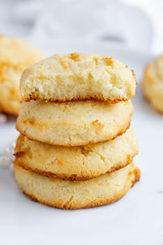 a stack of cookies sitting on top of a white plate