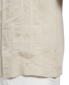 Get into a tropical state of mind. This men’s short sleeve button-down shirt combines classic guayabera buttoned pockets and vertical pintcuks with a subtle embroidered pattern. Wear this comfortable smooth-draping tropical shirt untucked over shorts or linen pants for a laid-back but sophisticated island look. 55% Ramie / 45% Viscose Classic Fit Plain Weave Fabrication Weaves In Criss-Cross Patterning For Extra Durability Buttoned Pockets, Vertical Pintucks Short Sleeve Machine Wash Imported | Beige Camp Shirt With Camp Collar And Button Closure, Beige Camp Shirt With Button Closure And Camp Collar, Embroidered Short Sleeve Shirt For Beach, Guayabera Groomsmen, Beige Camp Shirt With Button Closure, Mens Guayabera Outfit, Mens Guayabera Shirts, Cuban Guayabera, Men’s Guayabera Outfit