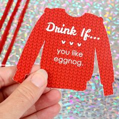 someone is holding up a card with the words drink if you like eggnog