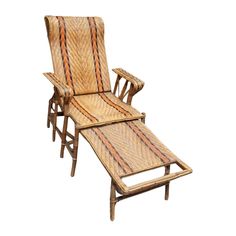 a chair and ottoman made out of bamboo with stripes on the back, sitting next to each other