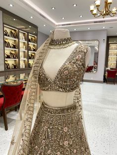 Are you ready to be a blushing bride? Bridal Lehenga BL-014 is the perfect pick to bring your wedding dreams to life! This elegant lehenga is designed to make you look like a party-popper, ensuring you're the star of the show! Join the wedding brigade in style and be the 'belle of the ball'! 💃 Fabric: Organza WASH CARE INSTRUCTIONS - Please Dry clean only when it is applicable Ready to Ship! Festive Reception Sets With Tilla Details, Elegant Designer Tilla Sharara, Kundan Sharara For Wedding, Designer Bollywood Choli With Tilla Detailing, Hand Embellished Floor-length Choli For Reception, Bollywood Style Designer Choli With Tilla, Festive Gold Semi-stitched Wedding Dress, Gold Wedding Dress With Sheer Dupatta, Hand Embellished Wedding Dupatta For Diwali