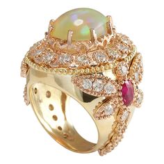 Stamped: 14K Yellow GoldTotal Ring Weight: 17.7 GramsRing Length: N/ARing Width: N/AGemstone Weight: Total Natural Opal Weight is 3.82 Carat (Measures: 14.79x11.66 mm)Color: MulticolorGemstone Weight: Total Natural Ruby Weight is 1.24 CaratColor: RedDiamond Weight: Total Natural Diamond Weight is 2.65 CaratColor: F-G, Clarity: VS2-SI1Face Measures: 26.50x23.60 mmSku: [704156W] Luxury Multi-stone Cluster Ring, Luxury Gold Opal Ring, Luxury Gold Multi-stone Opal Ring, Luxury Gold Opal Ring Hallmarked, Luxury Gold Opal Ring With Cabochon, Luxury Yellow Gold Opal Ring, Luxury Multi-stone Rose Gold Ring, Luxury 14k Gold Ruby Ring With Gemstone Accents, Luxury Ruby Ring With Gemstone Accents