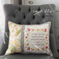 a gray chair with a quilted pillow on it's back and the words, simple stitches fabric shop