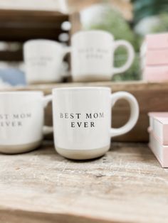 three coffee mugs with the words best mom ever on them are sitting next to each other