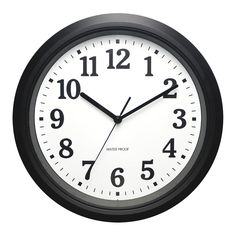 a black and white wall clock with numbers on the face is shown against a white background