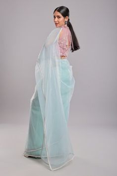 Ice blue pre-draped saree with embroidered border. Paired with pearl embroidered padded blouse. - Aza Fashions Pre-draped Saree With Zari Work, Pre-draped Tissue Silk Saree With Dupatta, Bollywood Style Draped Tissue Silk Dupatta, Festive Pre-draped Set With Sheer Dupatta, Organza Blouse With Traditional Drape, Eid Unstitched Draped Blouse Piece, Designer Wear Draped Dupatta With Unstitched Blouse, Unstitched Draped Blouse Piece For Eid, Eid Special Draped Unstitched Blouse Piece