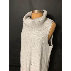 Elevate Your Wardrobe With This Stunning Talbots Sleeveless Knit Top In Natural Gray. The High-Quality Fabric And Impeccable Design Make It A Must-Have For Any Fashion-Forward Woman. The Top Is Available In Size Large And Is Perfect For Any Casual Or Formal Occasion, Adding A Touch Of Elegance To Your Look. The Top Is Brand New With Tags, Ensuring That You Get A Fresh And Unused Piece. It Features A Basic Style That Is Both Timeless And Versatile, Making It An Essential Addition To Your Wardrobe Winter Sleeveless Knit Sweater Vest, Knit Sleeveless Sweater Vest For Winter, Winter Knit Sleeveless Sweater Vest, Casual Cable Knit Sleeveless Tank Top, Sleeveless Knit Sweater Vest, Casual Sleeveless Knit Sweater, Fitted Sleeveless Gray Sweater Vest, Sleeveless Knit Tank Top For Winter, Sleeveless Knitted Vest For Layering