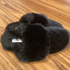 Elevate Your Casual Footwear Game With These Coach Zuri Slippers For Women. Crafted With Faux Fur, These Slip-On Slippers Feature A Round Toe Shape And Fur Trim Accents. The Black Slippers Boast The Iconic Coach Logo Pattern And Are Designed With A Comfortable Flat Rubber Outsole, Perfect For The Winter, Fall, And Spring Seasons. These Signature Coach Slippers Are Available In Size 6b And Are Perfect For Any Casual Occasion. The Insoles And Lining Are Made Of Faux Fur, Adding Warmth And Comfort Coach Slippers, Slippers Black, Black Slippers, Casual Footwear, Slippers For Women, Coach Logo, Comfortable Flats, Logo Pattern, Christmas Stuff