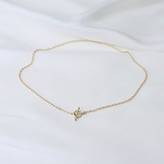 "14K Gold Toggle and Rolo chain necklace *The chain, toggle clasp and all components are 14K yellow gold (If you order a 16\" necklace, it will be a toggle clasp plus chain will be 16\".) The toggle clasp is about 12mm. 2.3mm Rolo chain Please read our policies before you place your order. https://www.etsy.com/shop/SashJewelry/policy?ref=shopinfo_policies_leftnav To see other Mother daughter necklace set click here: https://www.etsy.com/shop/SashJewelry?section_id=12441134&ref=shopsection_le Gold Link Toggle Necklace With Delicate Chain, Gold Minimalist Chain Link Toggle Necklace, Gold Minimalist Toggle Chain Link Necklace, Gold Chain Link Toggle Necklace In Minimalist Style, Dainty Gold Toggle Necklace With Lobster Clasp, Minimalist Gold Chain Link Toggle Necklace, Minimalist Gold Toggle Chain Link Necklace, Dainty Gold Toggle Necklace With Delicate Chain, Elegant Yellow Gold Toggle Necklace With Cable Chain