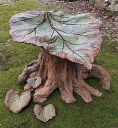 a tree stump with some leaves on it