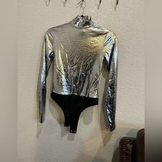 New Afrm Bodysuit Silver Size Small Metallic Stretch Bodysuit For Club, Silver Shiny Stretch Bodysuit, Metallic Shiny Bodysuit For Night Out, Disco Metallic Bodysuit For Club, Metallic Fitted Long Sleeve Bodysuit, Metallic Long-sleeve Bodysuit For Party, Metallic Long Sleeve Bodysuit For Party, Silver Fitted Bodysuit For Party, Fitted Silver Bodysuit For Party