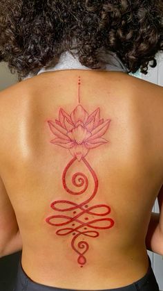 a woman with a tattoo on her back