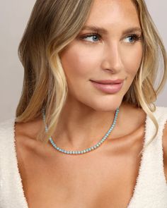 Explore the elegant 16 inch Grand Heiress gold blue opal tennis necklace from Melinda Maria. Shop online & enjoy FREE shipping! Elegant Light Blue Beaded Necklace, Elegant Blue Turquoise Necklace With Round Beads, Light Blue Clavicle Chain Necklace, Elegant Light Blue Single Strand Beaded Necklace, Elegant Blue Crystal Necklace With Clavicle Chain, Elegant Single Strand Turquoise Jewelry, Elegant Turquoise Single Strand Jewelry, Elegant Turquoise Gemstone Crystal Necklace, Elegant Single Strand Blue Jewelry