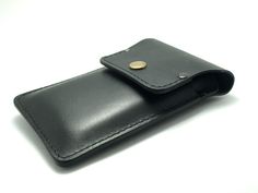 "This case is from our handmade black ( number 6 from photos ) genuine leather 100% wallet. leather is thickness 1,8 mm- 2,3 mm which offers great protection for your best friend. This elegant leather phone case has black leather pocket - to fit 3-5 cards, ID, some cash and a belt loop o nthe back- 5cm or 2\" Sleeve closes with one brass snaps button. To customize your purchase, you can choose from the options - flap and back side color leather ( see colours on the photos #7 and #8 ) and choose Black Rectangular Wallet With Belt Clip, Black Leather Cases With Card Slots, Black Leather Case With Card Slots, Black Wallet As Mobile Phone Bag, Black Rectangular Case For Everyday Carry, Iphone Leather, Brown Cow, Cell Case, Pocket Cards