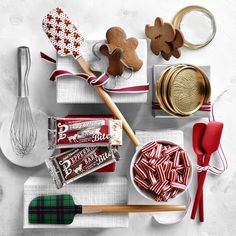 some cookies, candy and other items on a table