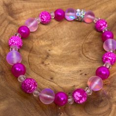 Shades of Pink Stretch Bracelet Custom Made in The USA Pink Round, Shades Of Pink, Bead Bracelet, Stretch Bracelet, Stretch Bracelets, Made In The Usa, Custom Made, Beaded Bracelets, Shades