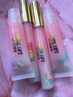 THIS MAY BE THE BEST BIRTHDAY CAKE GLOSS YOU'VE EVER TRIED! Smells and taste just like a strawberry birthday cake. We've added CHOCOLATE FUDGE CAKE w/ vanilla frosting and sprinkles. This is a TREAT for your lips! Our Birthday Cake lipgloss will definitely have you licking your lips! If you managed to keep it on your lips without licking it all off, this gloss will leave your lips nice and soft. It will treat dry cracked lips as all my glosses will. Very shiny without being sticky. All my glosse Lip Gloss Flavor Ideas, Handmade Lip Gloss, Colored Lip Gloss, Sprinkle Lips, The Best Birthday Cake, Best Birthday Cake, Dry Cracked Lips, Lip Gloss Homemade, Lip Gloss Cosmetics