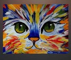 a colorful painting of a cat's face with green eyes and whiskers