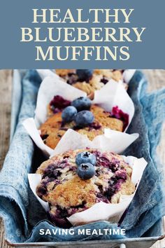 blueberry muffins with fresh berries in the middle