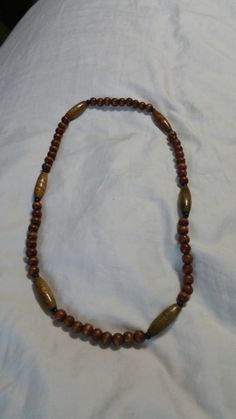 Metal and Clasp Free, 28 inch Wooden Beaded Necklace, Dark Brown Beads with Brown Oval Beads, Costume Jewelry, Fashion Accessory This is a nice find and priced to sell. Very decorative. This appears to not have any flaws. Check out our shop for monthly specials. We have a variety of items for every taste. Combine several of our items together to save on shipping. If you have any questions please do not hesitate to ask. I will ship outside of the US, just request a quote. Happy Shopping. I will w Adjustable Brown Beaded Necklaces With Oval Beads, Brown Necklaces With Polished Oval Beads, Brown Beaded Necklace With Colorful Oval Beads, Brown Beaded Necklaces With Oval Beads, Brown Beaded Necklace With Oval Beads, Brown Necklaces With Colorful Oval Beads, Brown Wooden Beads Oval Jewelry, Brown Wooden Oval Beads Jewelry, Brown Jewelry With Oval Wooden Beads