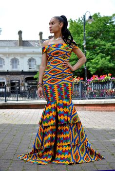 CUSTOM MADE: Our prom dresses are to be custom made in any fabric seen;  tell us your size and fabric, and we will get it to you for your special day! This women's African Kente Print prom/special occasion dress is made from 100% cotton quality fabrics.It's available to come custom made. We can also make personalised dresses if you message me with the fabric and styles, and I will update you on prices. Wash at 30 degrees. Wash similar colours, Hand wash for first wash. Also comes in sizes  Deliv African Prom Dress, African Clothing Stores, Dress Stores, Kente Print, Printed Prom Dresses, Dashiki Dress, African Prom Dresses, African Wedding Dress, Dress African