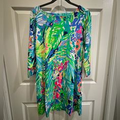 Lilly Pulitzer Sophie Upf 50+ Dress Color: Multi - Purrfect New With Tags 3/4 Length Sleeves. Boatneck With Gold Button Detail On Shoulders And Cuffs. 93% Rayon, 7% Spandex Fabric Provides Upf 50+ Protection. Smoke Free Home Perfect Condition. Green 3/4 Sleeve Dresses For Brunch, Green Summer Dress With 3/4 Sleeves, Green Beach Dress With 3/4 Sleeves, Casual Multicolor Dress With 3/4 Sleeves, Green 3/4 Sleeve Dress For Vacation, Green Dress With 3/4 Sleeves For Vacation, 50 Dress, Lilly Pulitzer Dress, 50's Dress