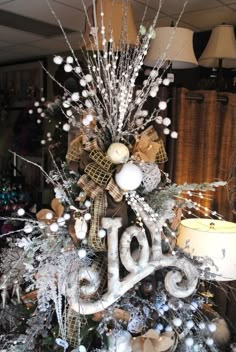 a christmas tree decorated with ornaments and lights