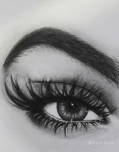 a pencil drawing of an eye with long lashes