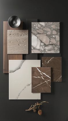 marble and wood are arranged on the wall in this modern interior design project, which is inspired by natural materials