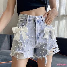 Qteee - Chic Pearl-Embellished High Waisted Denim Shorts with Bowknot Detail Casual Jean Shorts For Summer Party, Casual Summer Party Jean Shorts, Spring Party Denim Jean Shorts, Casual Denim Bottoms For Party, Casual Denim Party Bottoms, Trendy Spring Bottoms With Bow Detail, Casual Jeans For Spring Party, Spring Party Jeans In Short Length, Spring Party Jeans Shorts