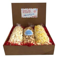 three different types of popcorn in a box