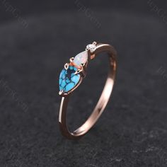 Unique Turquoise Wedding Band, Dainty Jewelry Gift for Her, Moissanite Bridal Ring for Women, Delicate Opal Engagement Ring Main Stone: 4x6mm Pear Cut Turquoise. Side Stone: Opal, Zircon/Moissanite/Diamond Band width: approx 2.1mm Our Services: All sizes are available, if you need other ring sizes, please feel free to contact me. Production Time: Since all rings are handmade according to orders, it takes about 13-15 working days (excluding weekends) to make, and 3-5 working days to arrive, thank you for your understanding. Expedited Order: We provide expedited order service, it takes about 7-10 working days (excluding weekends) to complete the ring, and 3-5 working days to arrive, if you are in a hurry to get the ring, please contact me. Payment Plan: We offer payment plan, you can pay wee Handmade Elegant Turquoise Opal Ring, Southwestern Turquoise Opal Ring Gift, Turquoise Opal Ring For Anniversary, Fine Jewelry Style, Spiritual Turquoise Opal Gemstone Ring, Silver Turquoise Ring, Oval Shape, Gift, Turquoise Wedding Band, Turquoise Wedding, Wedding Band, Engagement Rings Opal